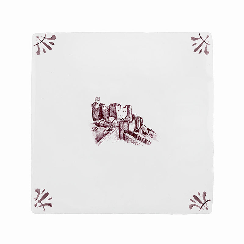 White tile with manganese castle design with decorative corners