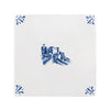 White tile with blue castle design with decorative corners